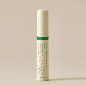 Vegan Collagen Eye serum bottle on a beige background